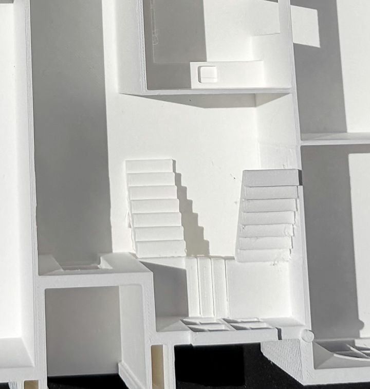 Close-up inside the Adeline model, looking down at a printed staircase between rooms